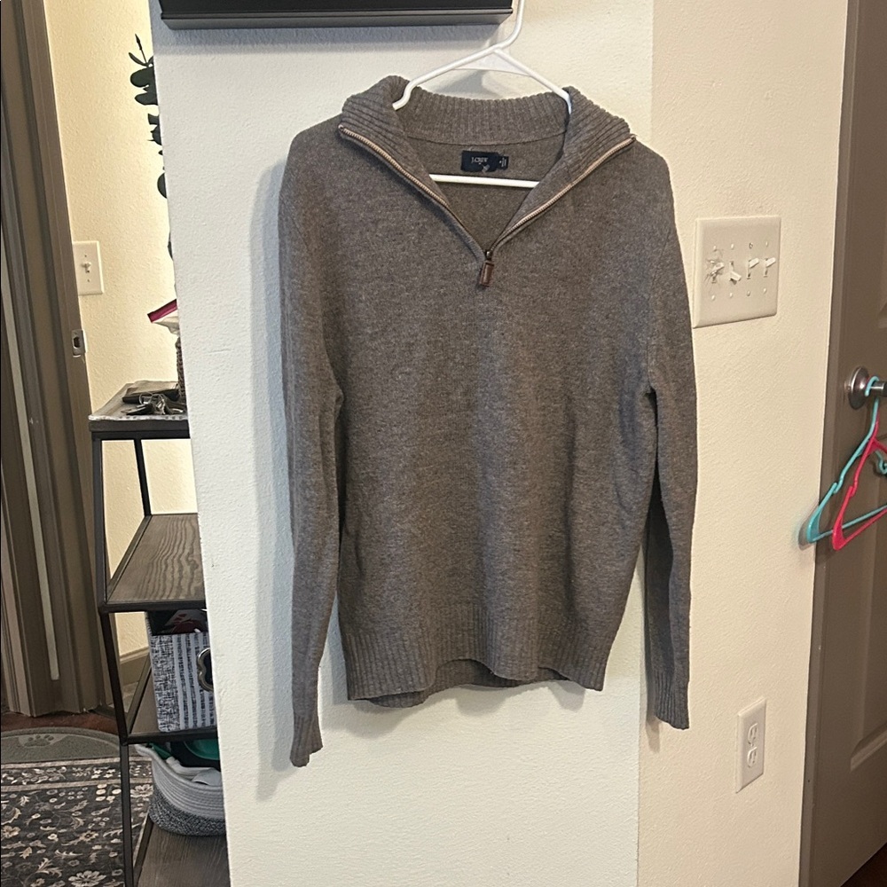 JCrew 100% Lambswool Sweater with a 1/4 zip at the neck.
